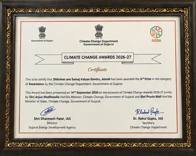 Framed certificate: “This is to certify that Shikshan ane Samaj Kalyan Kendra, Amreli has been awarded the 3rd Prize in the category of Awareness by the Climate Change Department, Government of Gujarat. This Award has been presented on 16th September 2026 on the occasion of Climate Change Awards 2026-27…”, signed by Shri Dharmesh Patel, IAS, Director, Gujarat Energy Development Agency, and Dr. Rahul Gupta, IAS, Secretary, Climate Change Department